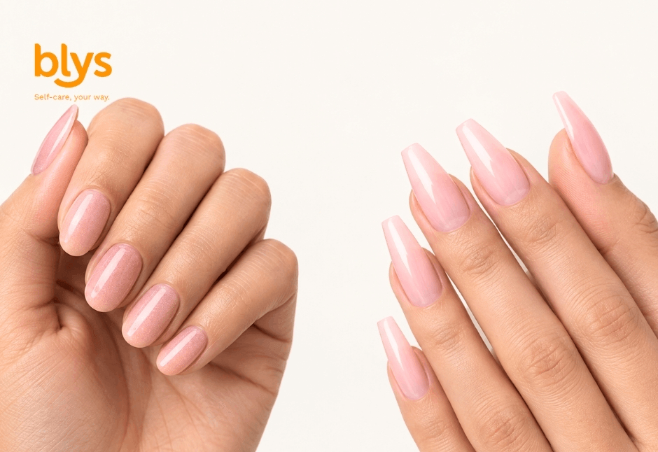 Two hands display glossy pink almond-shaped manicures; dip powder on the left and acrylic on the right, against a clean white background, with the orange “blys” logo in the corner.
