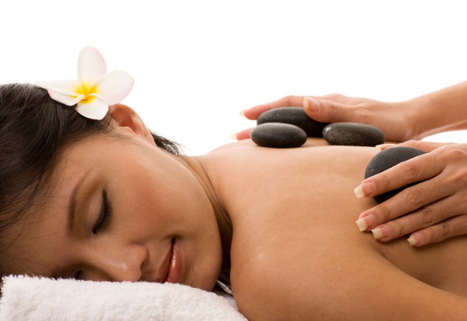 How does heat therapy help break down muscle knots